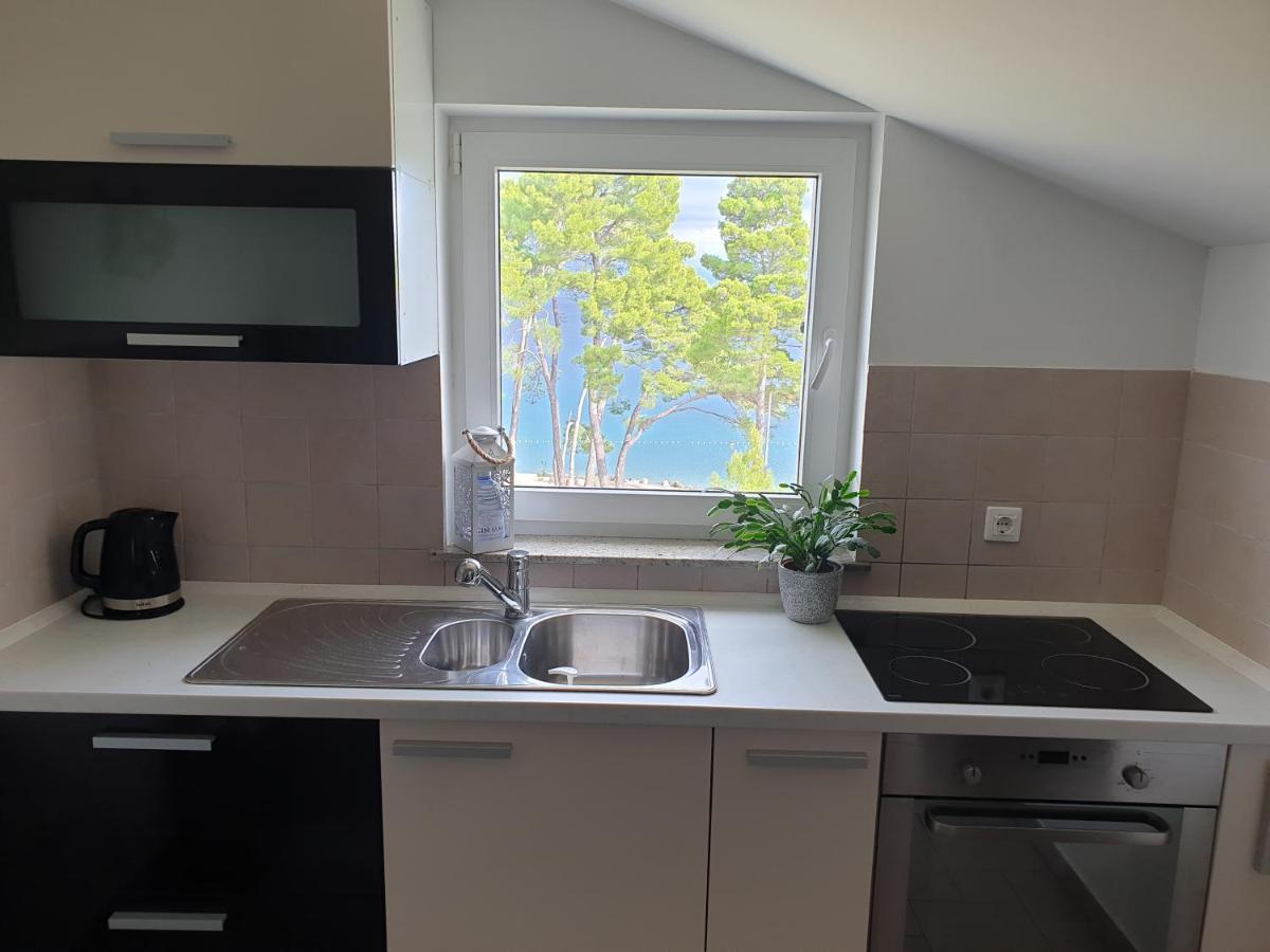 Apartments Mare & Mons Deluxe Малинска Экстерьер фото